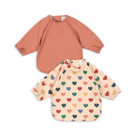 Konges Sløjd A/S Lätzchen coeur colore frappe/canyon rose